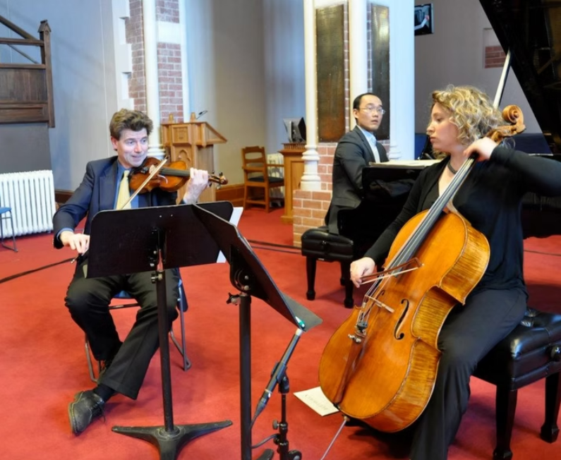 Cellist Inbal Meggido performs with the Te Kōkī Trio